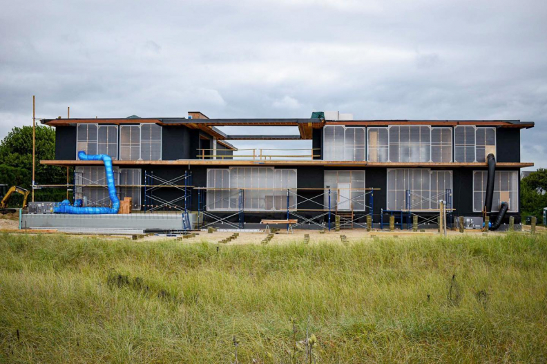 Construction of house using temporary window solutions