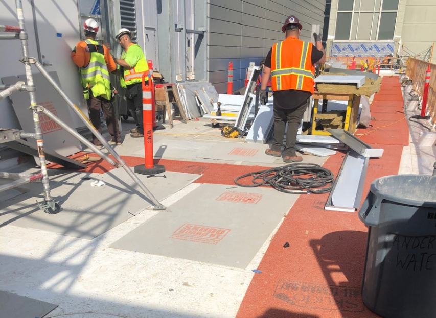 Workers outside on a worksite